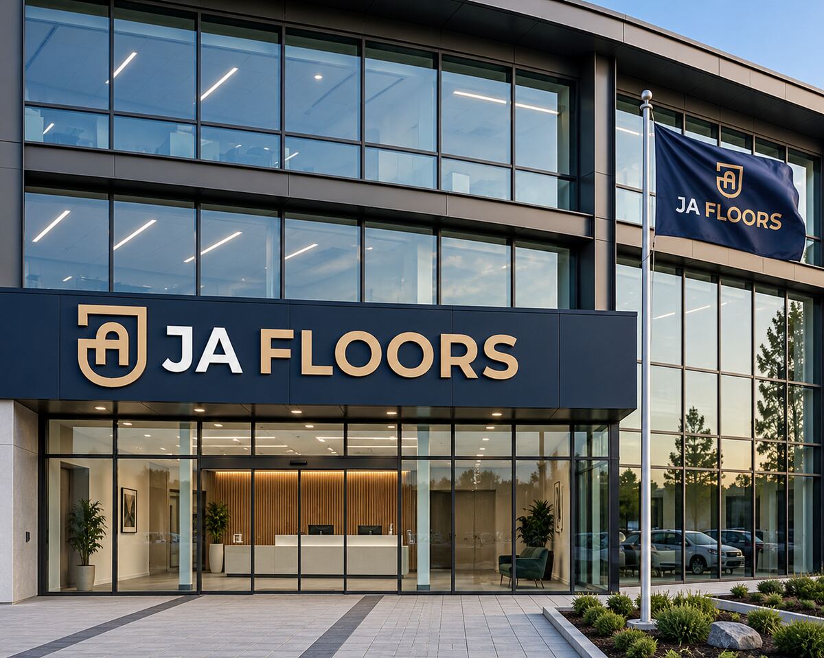 Modern commercial building with JA Floors signage