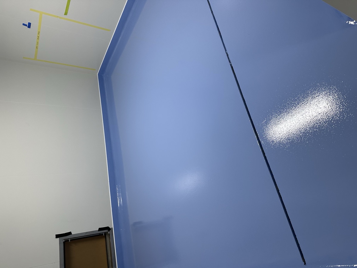 Resin flooring with coved detailing in a specialist commercial environment