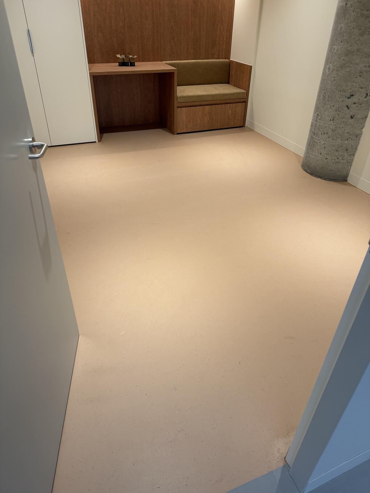 Marmoleum linoleum floor in a room with timber joinery at Move Beyond, installed by JA Floors