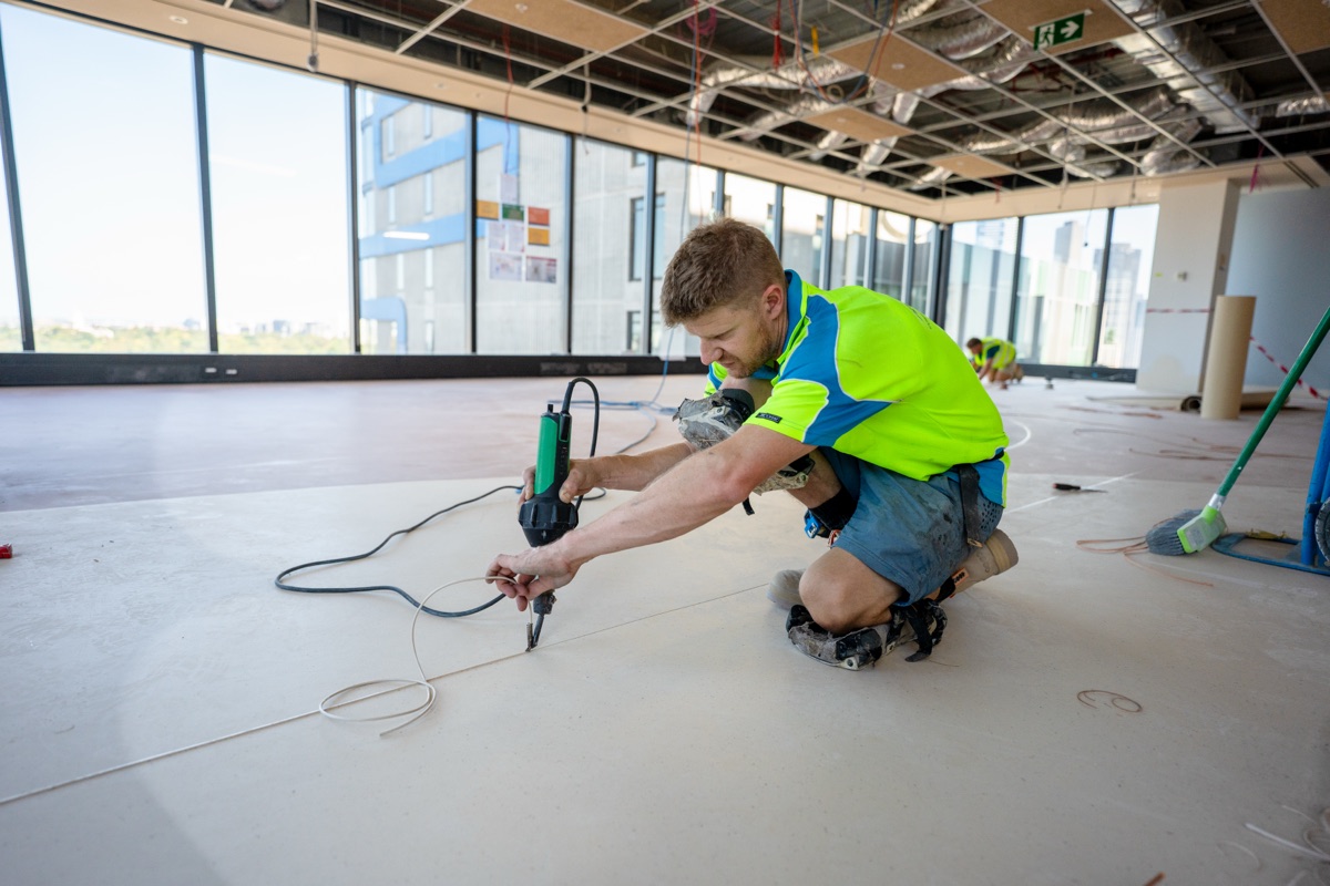 Commercial flooring installation by JA Floors in a Melbourne fit-out environment
