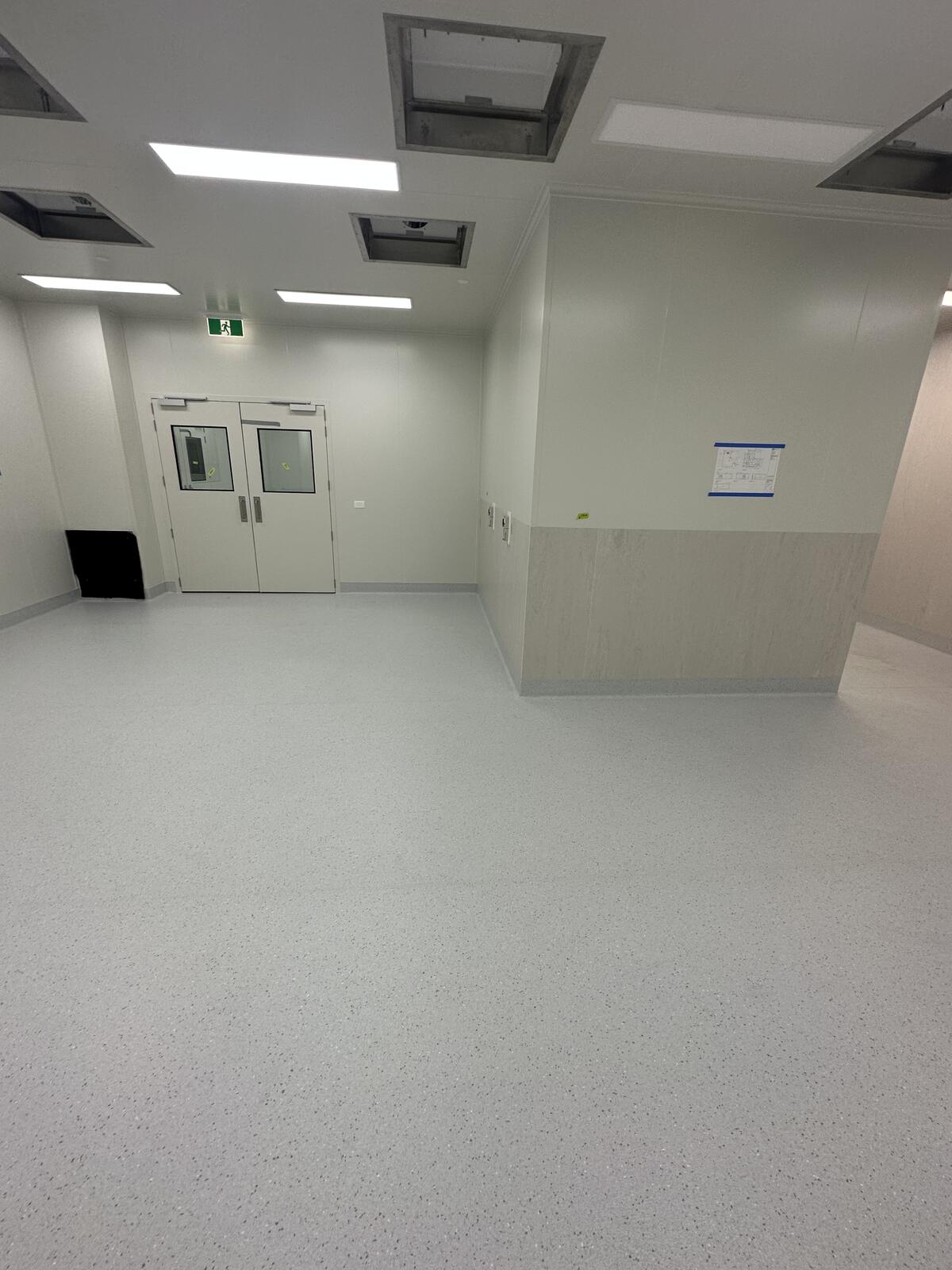 Coved vinyl in a PC2 room on the Paragon Care project, by JA Floors
