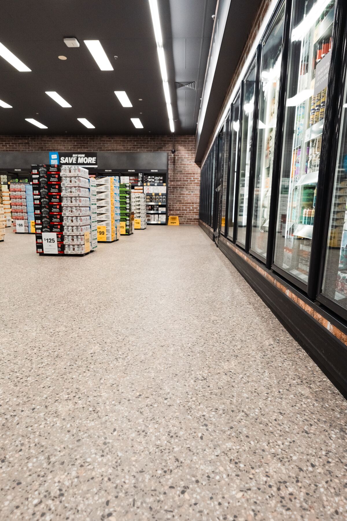Vinyl tile flooring along the fridge aisle of a Liquorland store in Mornington, installed by JA Floors