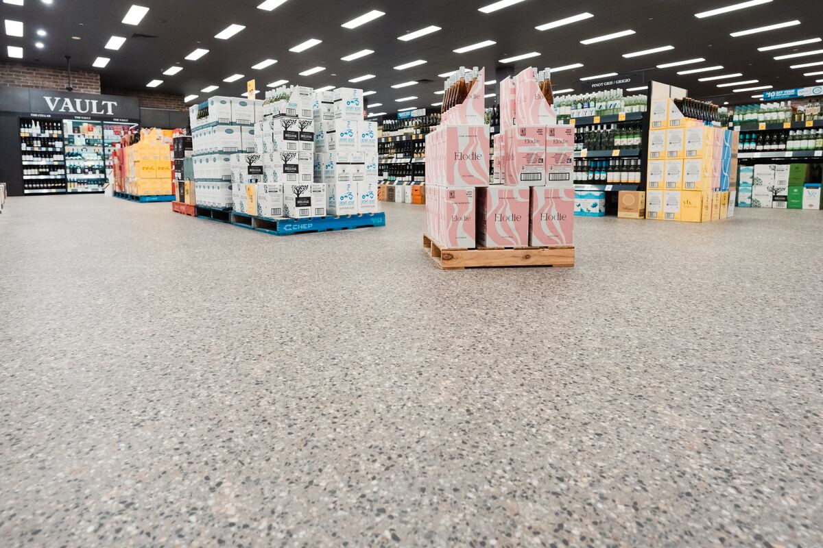 Vinyl tile flooring across a Liquorland store in Mornington, installed by JA Floors